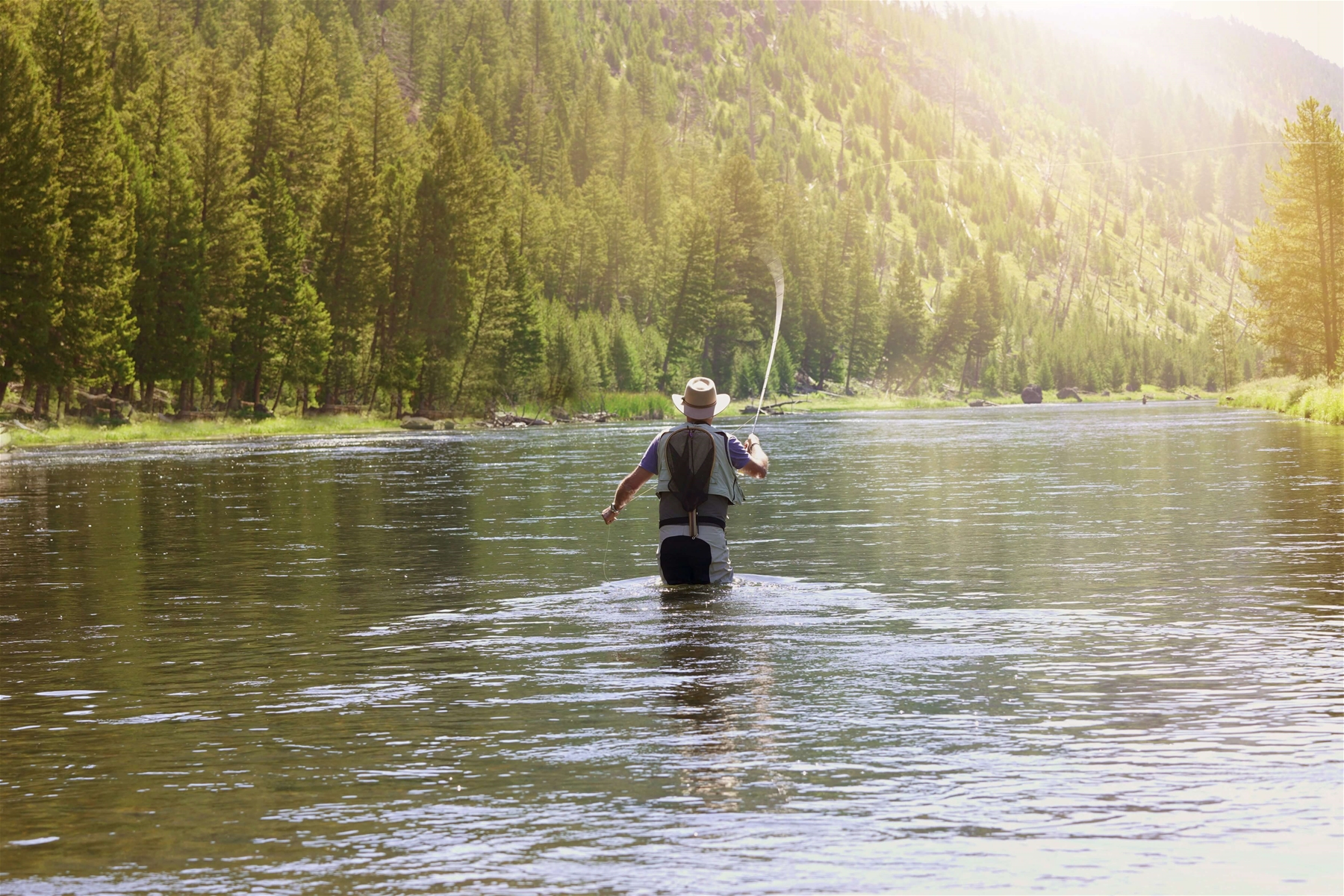 A man in Big Sky Fly Fishing.